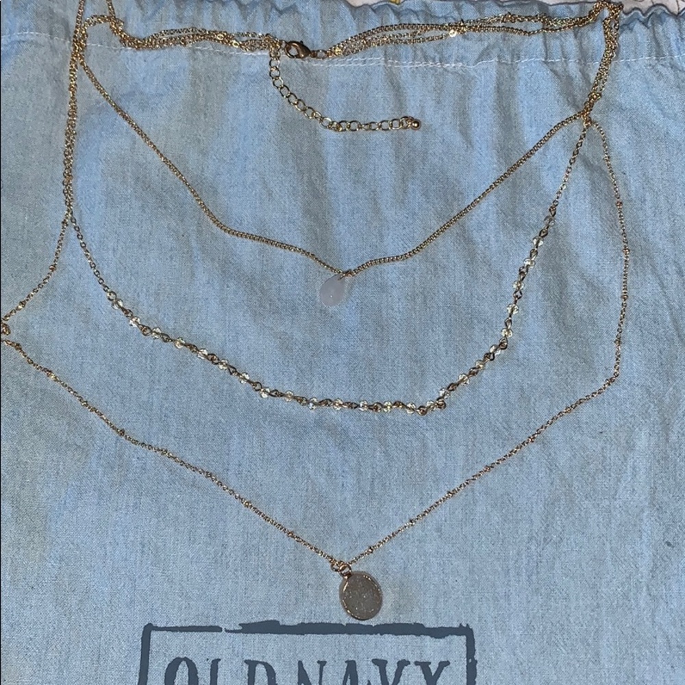 Three tiered gold necklace with quartz stones